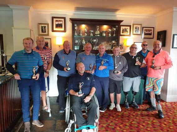 Martin Webb (1st left) with Scottish Pan-Disability Open Golf Championship trophy