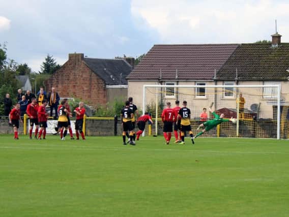 Mark Shanklands free-kick goal for Auchinleck on 34 minutes hits the Bellshill net (Pic by William Wood)