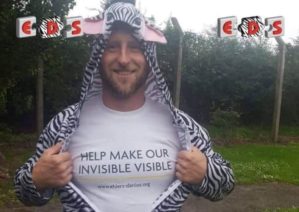 Adam Wallace is currently en route from Chester to Glasgow on his fundraising walk dressed as a zebra.