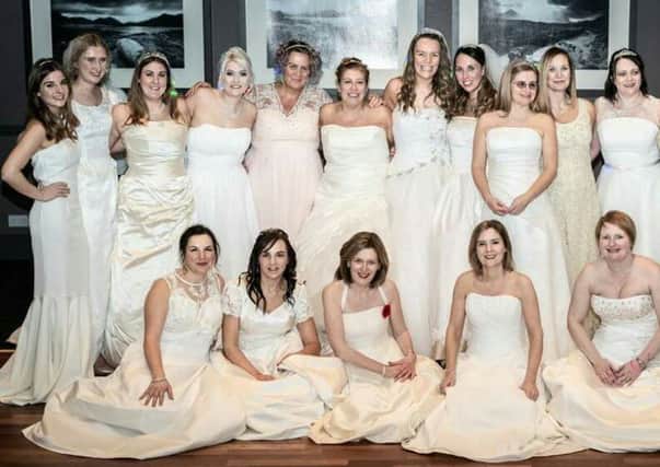 Lorraine seen on the left is  pictured with other brides at a previous event