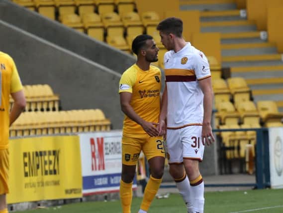 Declan Gallagher (right) in action for Motherwell against his old team Livingston earlier this season (Pic by Ian McFadyen)