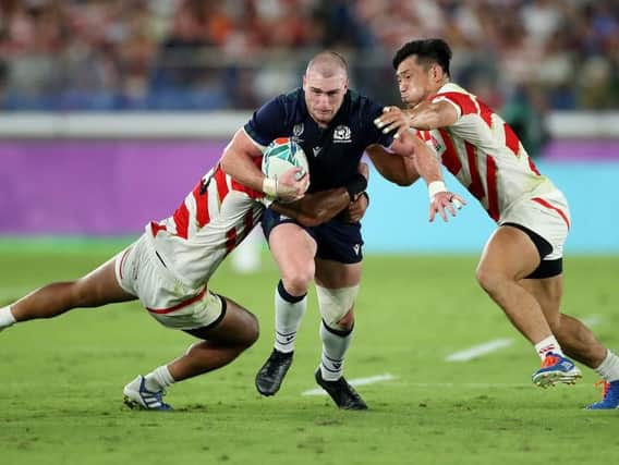 Stuart Hogg is stopped in his tracks by the Japan defence. Picture: Getty Images