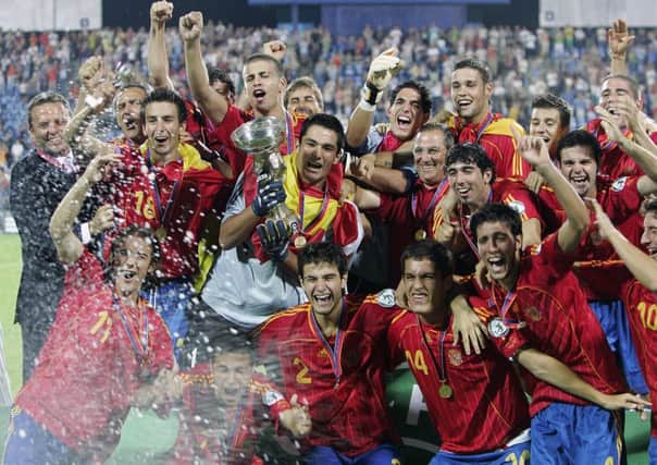 The Spanish team celebrate after winning the gold medal of the UEFA Under 19 Championships  after the match against Scotland 2:1 in Poznan 29 July 2006. AFP PHOTO / JANEK SKARZYNSKI (Photo credit should read JANEK SKARZYNSKI/AFP/Getty Images)