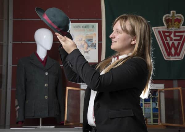Jennifer Hunt, Archivist, Royal Voluntary Service Heritage Collection with a 1940s WVS hat (Photo: Martin Shields)