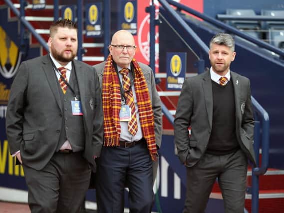 Alan Burrows (1st left) is pictured with Motherwell FC chairman Jim McMahon and manager Stephen Robinson