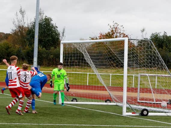 Paul Donaghy scores Carluke Rovers winner against Lesmahagow on Saturday (Pic by Kevin Ramage)
