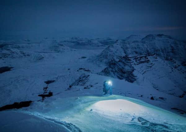 Night-time on Beinn Alligin. Mountaineering Scotland is urging hillwalkers and climbers to make sure they are properly prepared for venturing out on to the mountains during the winter months. (Photo: Zak Mooney)