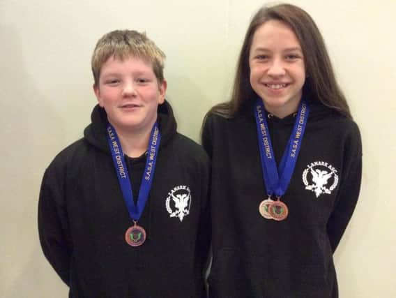 Justin and Millie with medals (Pic by Stuart Stevenson)