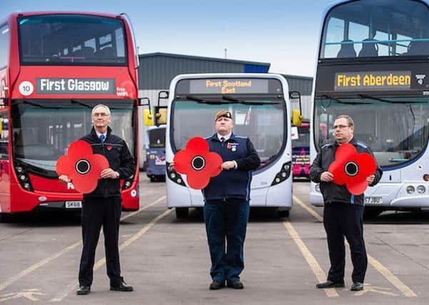 Drivers John Skinner, Ian Dixon and Ally Ferris promote free travel for all Veterans, Cadets and armed forces personnel for this year's Remembrance Sunday events (Photo: Lenny Warren / Warren Media)