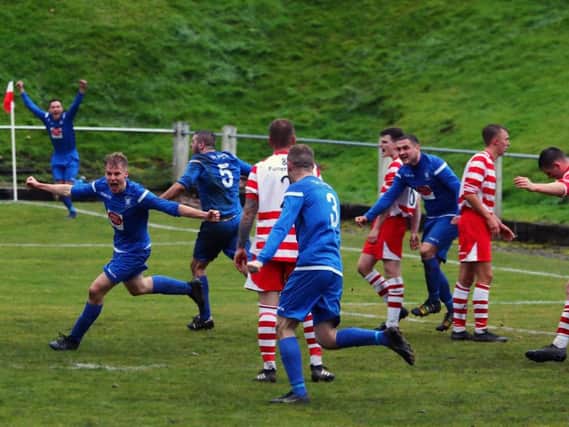 Lanark United players celebrate after Jordan Frasers late equaliser at Lesmahagow (Pic by George Reid)