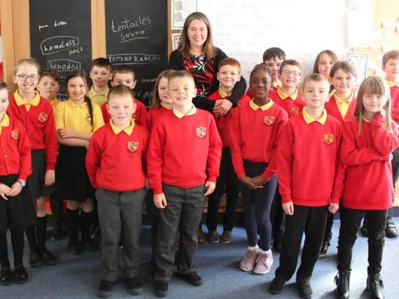 Aileen Campbell MSP is pictured with the pupils of Douglas Primary.