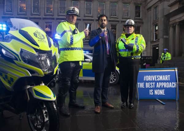 Launching this year's festive campaign, the first since the introduction of new drug-driving laws, are, from left, Chief Inspector Darren Faulds, Justice Secretary Humza Yousaf, and Superintendent Louise Blakelock, Police Scotlands Deputy Head of Road Policing.