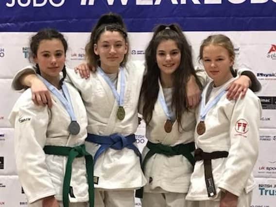 Lily (1st right) with the other British Championships under-57kg medallists