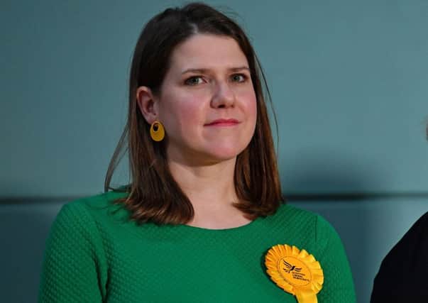 Britain's Liberal Democrat leader Jo Swinson waits on stage for the result at the East Dunbartonshire count centre in Bishopbriggs, north of Glasgow, on December 13, 2019 after votes were counted as part of the UK general election. (Photo by Paul ELLIS / AFP) (Photo by PAUL ELLIS/AFP via Getty Images)