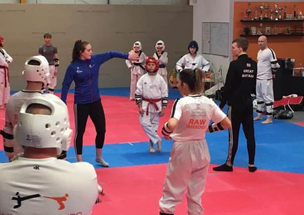 Raw Taekwondo Cumbernauld students with Rebecca McGowan and Bradley Sinden