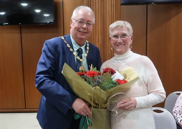 Provost Fletcher presents Evelyn Baxter with the 2019 East Renfrewshire Council Provost Award at Council Headquarters.