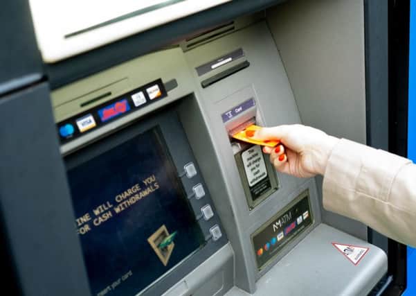 Shoppers are being urged to be vigilant when withdrawing cash from ATMs.