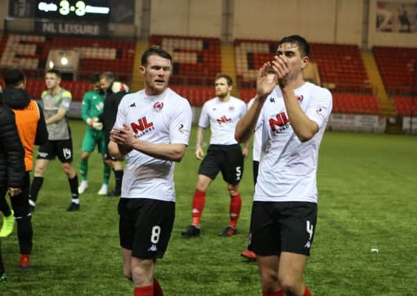 Alex Petkov (right) applauds the Clyde fans at the end of the final match of his loan spell against Stranraer at Broadwood on Saturday. (pic: Craig Black Photography)