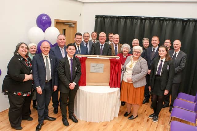 North Lanarkshire provost Jean Jones unveils a plaque at the official opening of the new Cumbernauld Academy