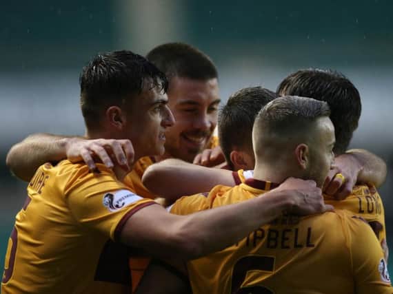 Motherwell players celebrate scoring in the 3-1 defeat at Hibernian in November (Pic by Ian McFadyen)