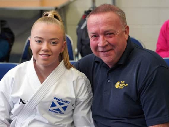 Carluke karate ace Emma Ruthven (pictured with her dad Drew) is accumulating medals at a formidable rate (Library pic).