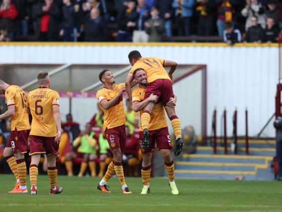 Motherwell players celebrate beating Hibs 3-0 at Fir Park on August 31 (Pic by Ian McFadyen)
