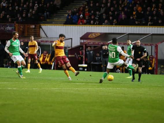 Motherwell's Liam Donnelly unleashes a shot at goal against Hibs on Saturday (Pic by Ian McFadyen)