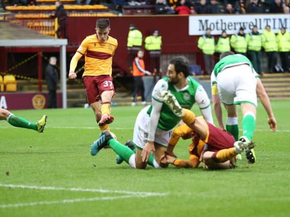 Motherwell youngster Ross MacIver shoots at goal during Saturday's 0-0 draw against Hibs (Pic by Ian McFadyen)