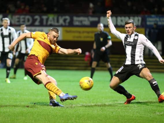 Motherwell's Allan Campbell strikes a shot which ended up in the St Mirren net to make it 4-4 in last Tuesday night's incredible Scottish Cup fifth round replay (Pic by Ian McFadyen)